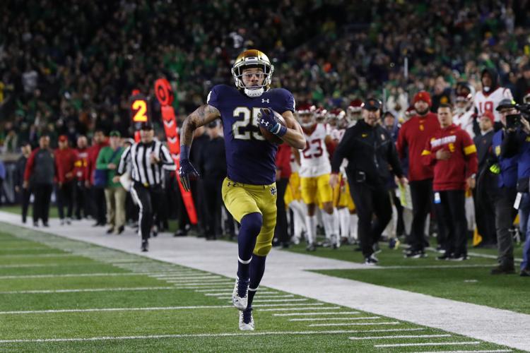 No. 13 Notre Dame hopes Dublin game against Navy helps expand