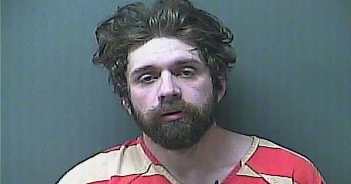 Wanted man in police pursuit allegedly stops to smoke, swims from cops after water crash