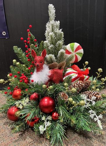 Traditional or contemporary, holiday florals bring magic to your table or gift list