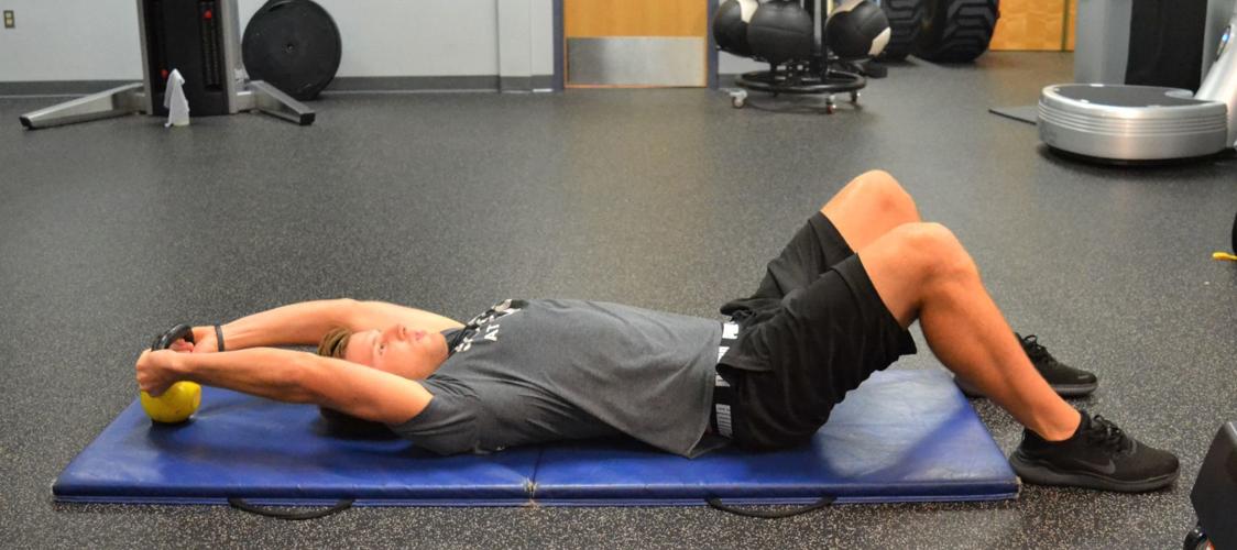 THIS WEEK'S EXERCISE Kettlebell pullover crunch