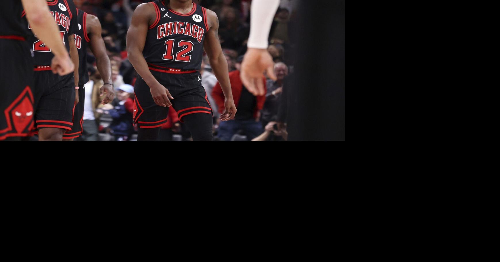 Ayo Dosunmu of the Chicago Bulls dunks the ball during the game