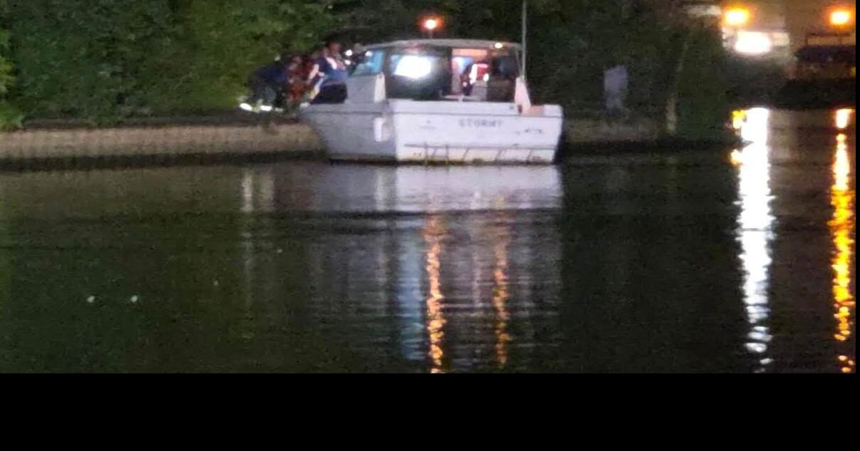 Michigan City divers go in after submerged vehicle