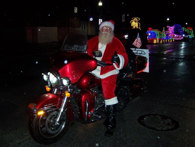 Rain doesn't dampen spirits at Whiting Illuminated Christmas parade