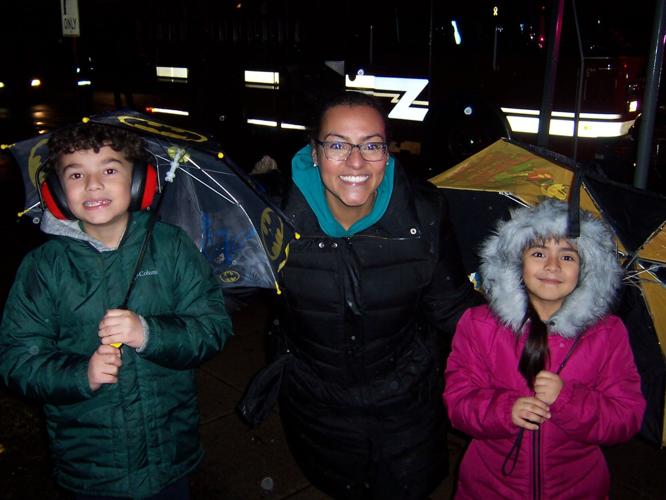 Rain doesn't dampen spirits at Whiting Illuminated Christmas parade