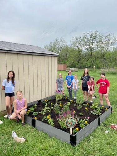 Girl Scout troop promotes conservation — earns Bronze Award — by planting pollinator garden in Frankfort park