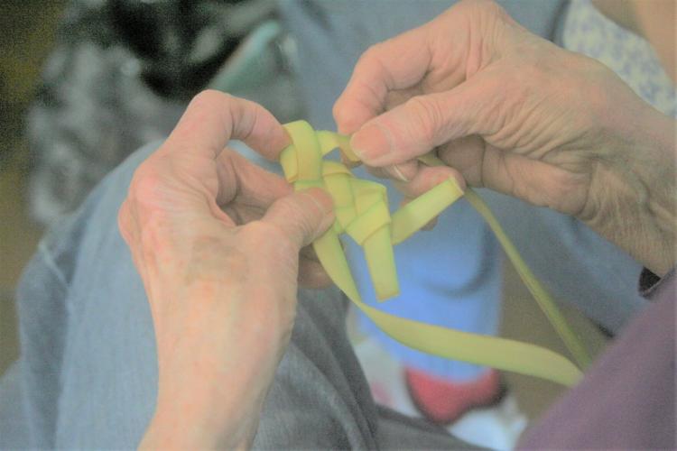 Braiding palms a "labor of love for God"