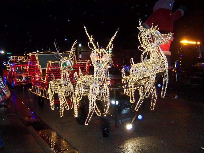 Rain doesn't dampen spirits at Whiting Illuminated Christmas parade