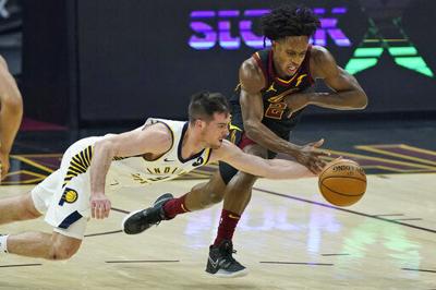 McConnell sets steals mark, Pacers rally past Cavs 114-111
