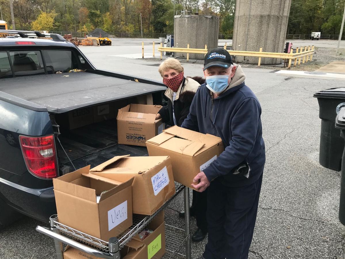 Kiwanians put new spin on food pantry donations