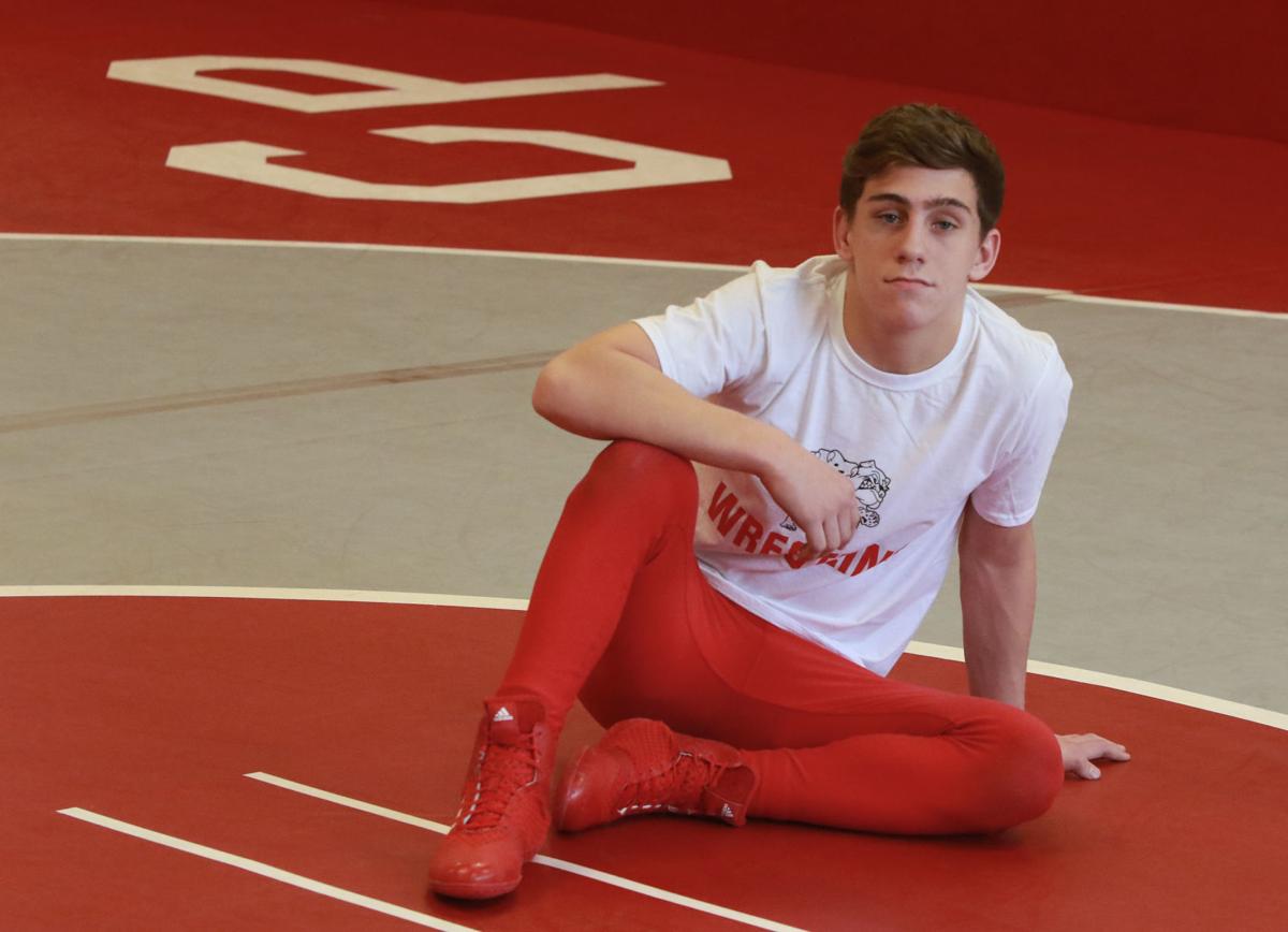 PREP WRESTLING: Mendez is already Crown Point s face as a freshman