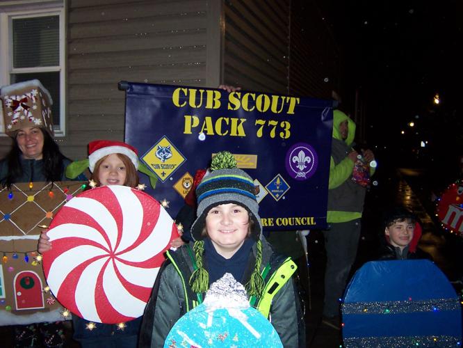 Rain doesn't dampen spirits at Whiting Illuminated Christmas parade