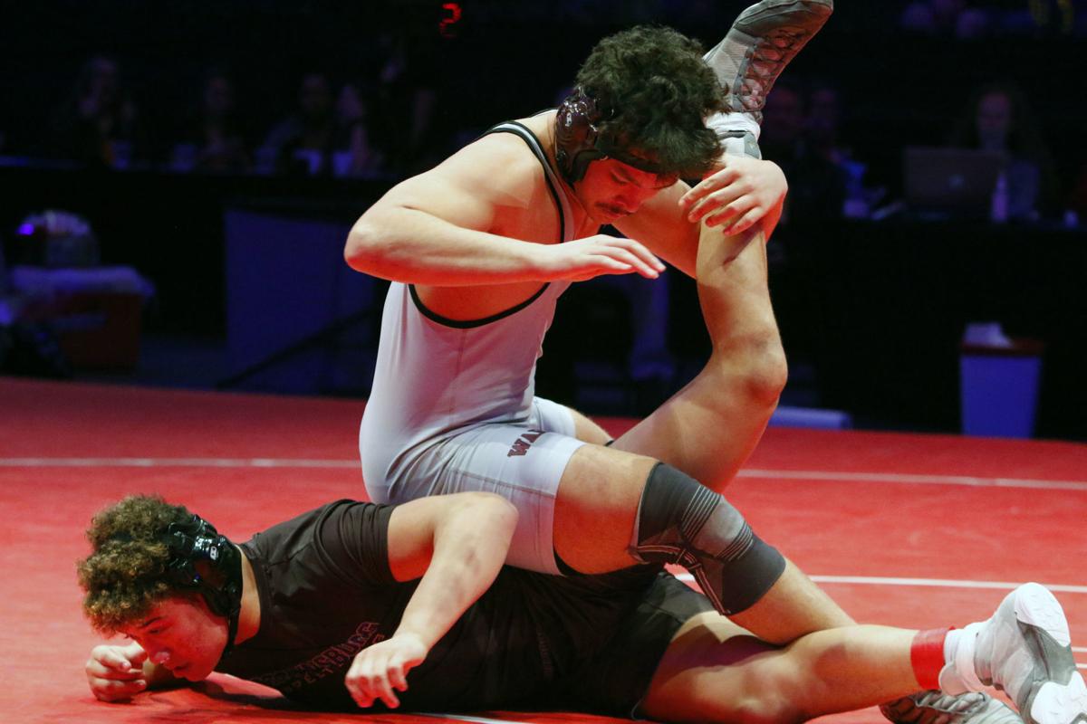 WRESTLING Calumet's Fowler earns family bragging rights with state