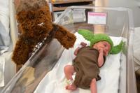 Babies don Baby Yoda caps at Franciscan Health hospitals