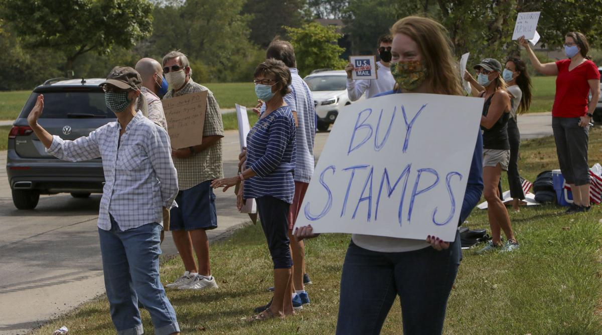 Demonstrators rally outside Valparaiso post office to protest USPS
