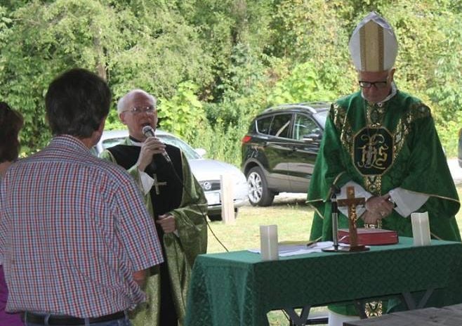 Rev. Terry Bennis with Bishop Donald Hying at Parish Picnic Mass at North Judson Park