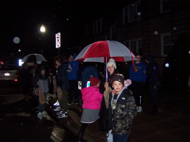 Rain doesn't dampen spirits at Whiting Illuminated Christmas parade