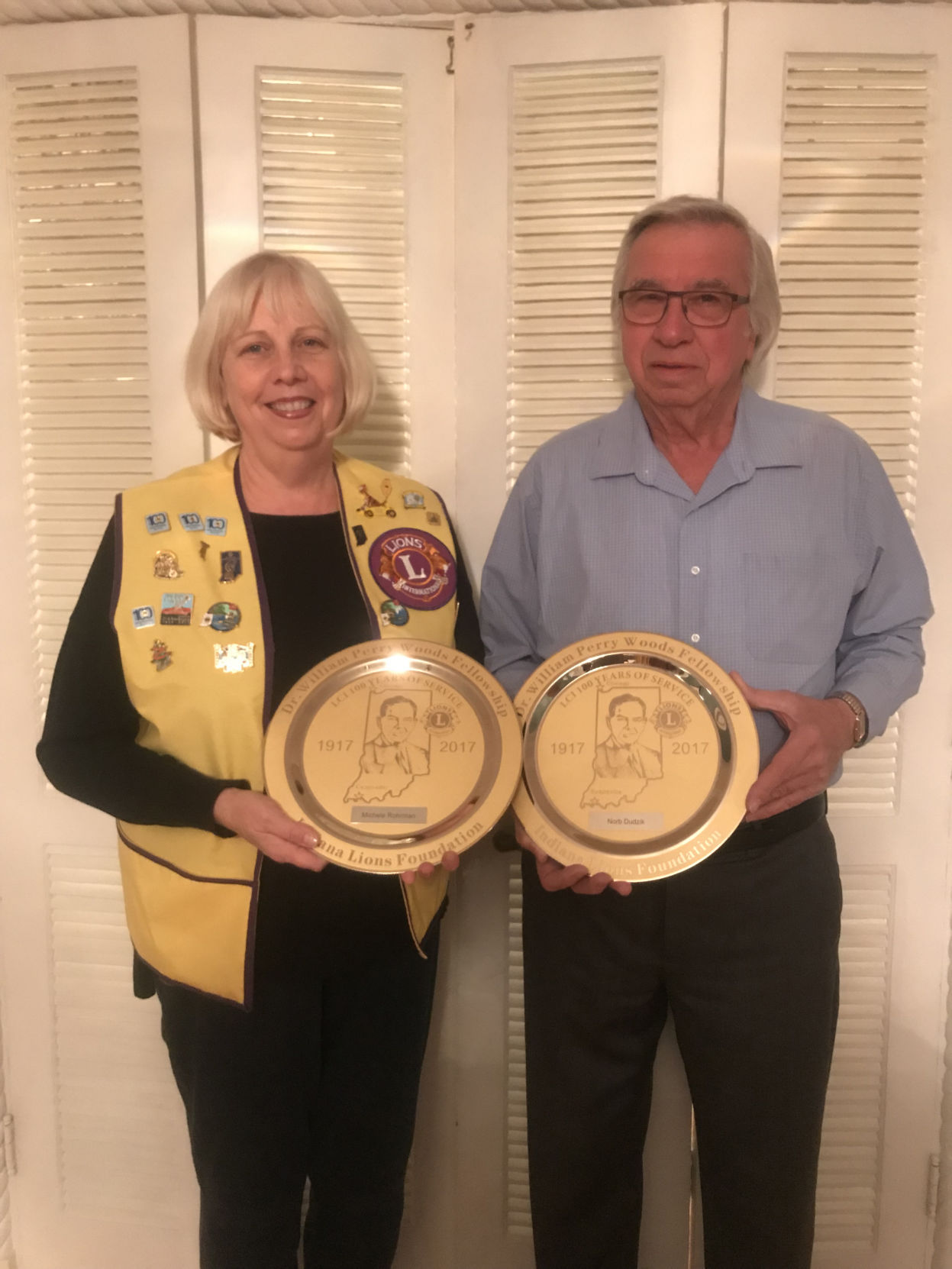 Two local Lions honored for dedication to local club