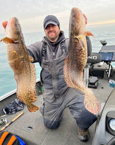 Chesterton man catches record fish in Lake Michigan