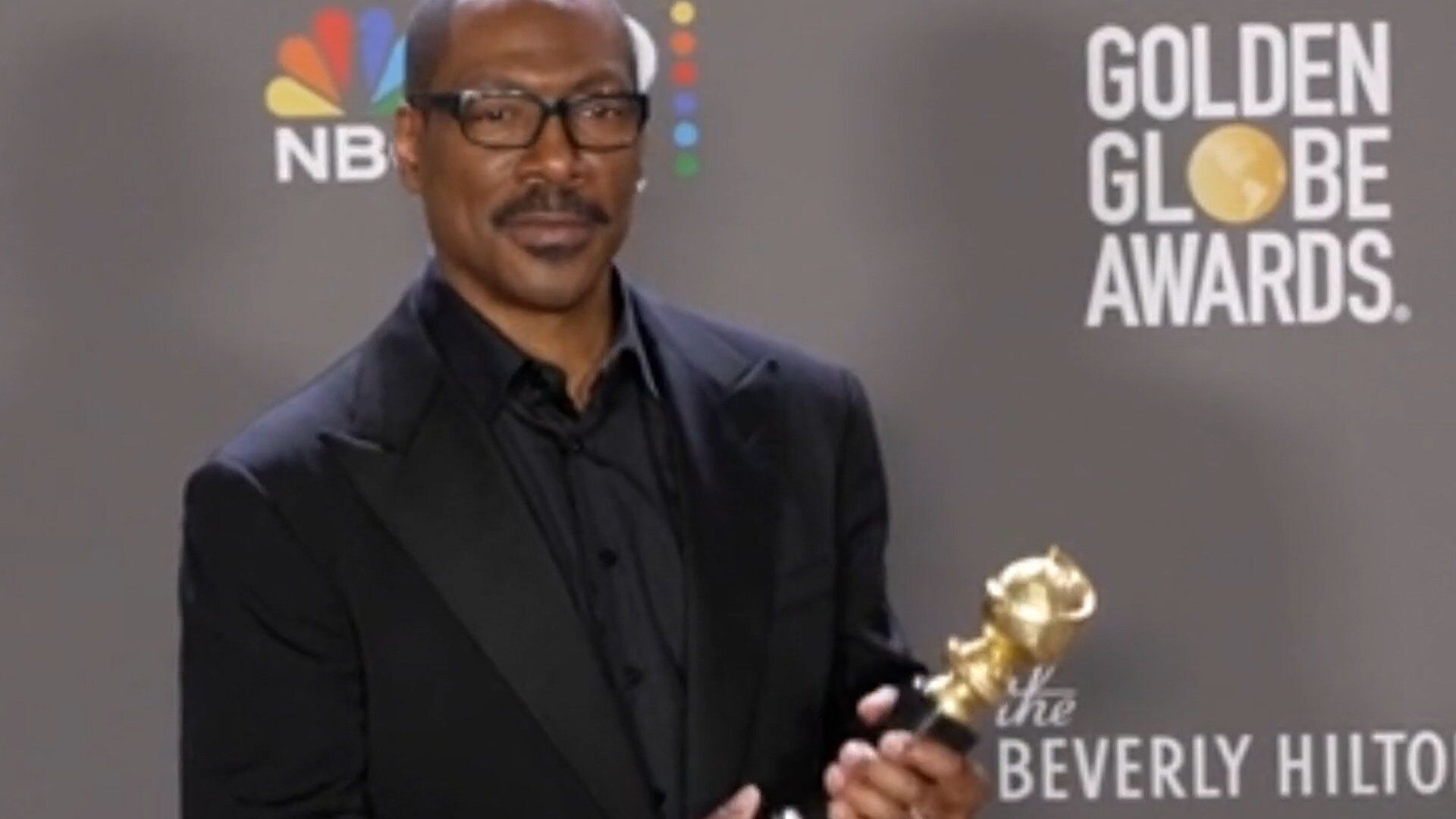 Eddie Murphy jokes about Will Smith slap as he accepts Golden Globes honor