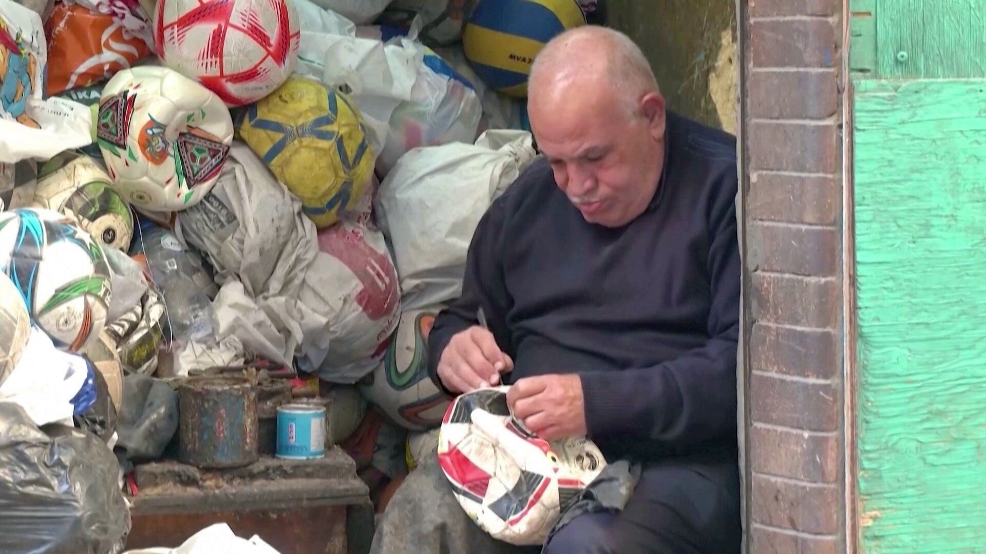 This Egyptian man has been repairing soccer balls for over 50 years