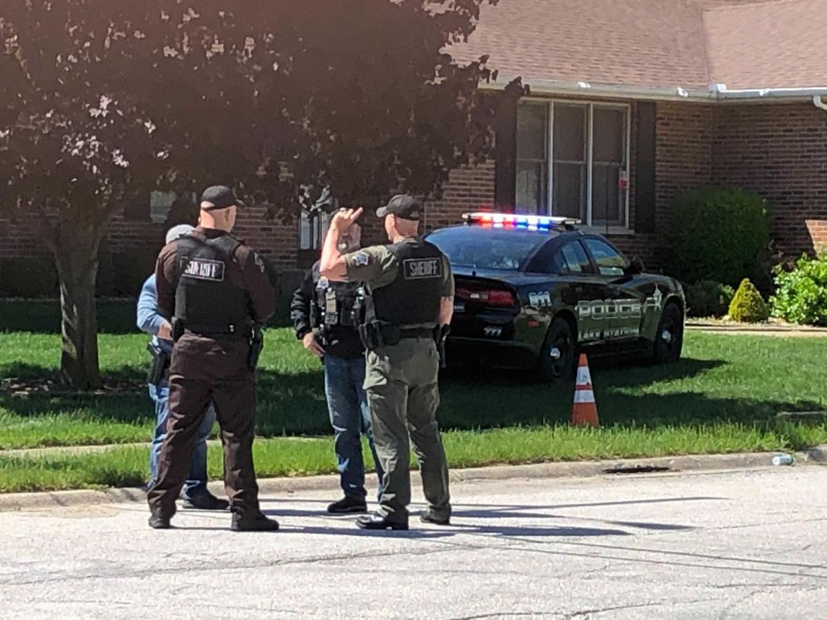 Stolen Lake Station squad car dumped on lawn; cops searching for suspects, police say