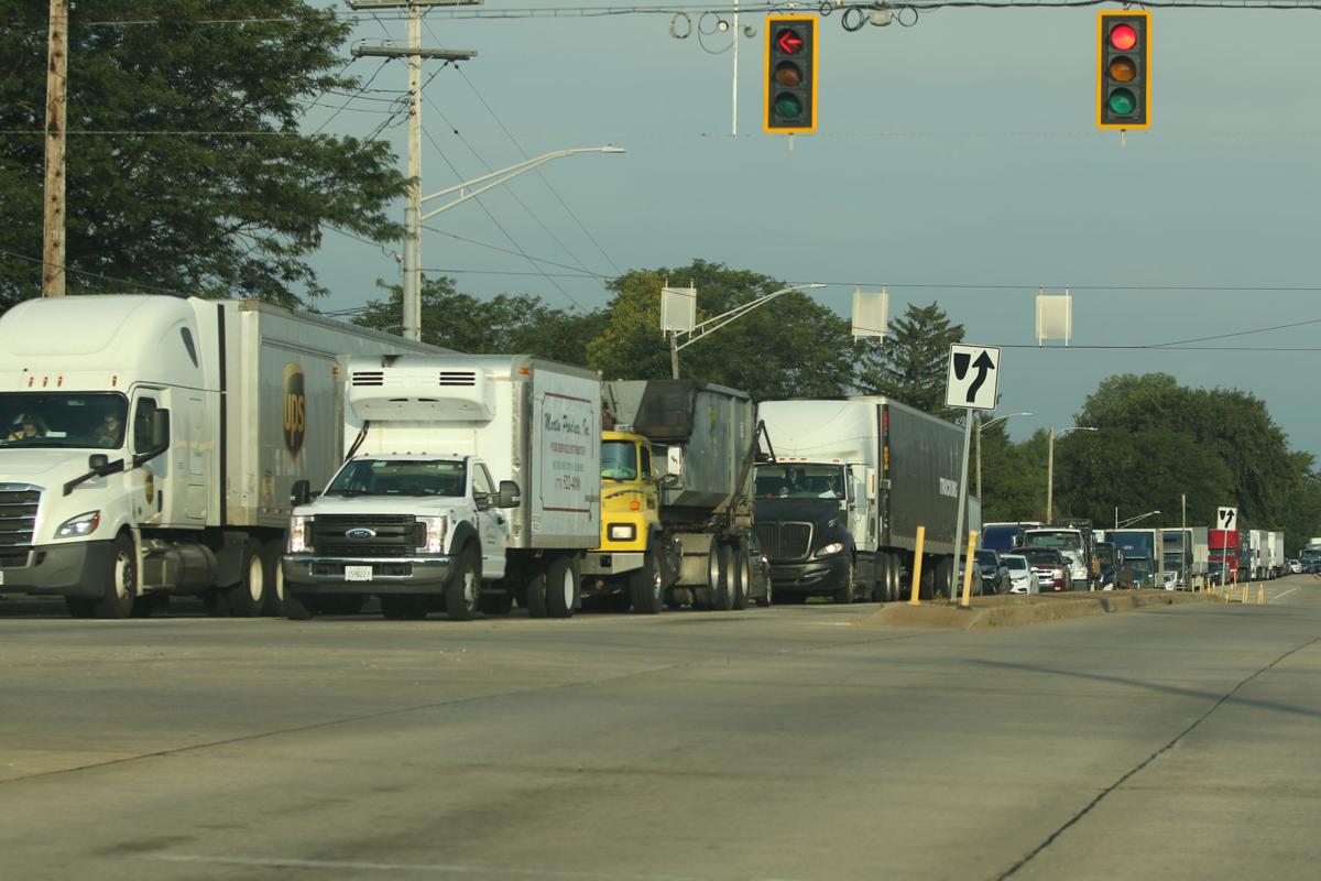 UPDATE: 2 dead after crashing into semitrailer on Borman Expressway