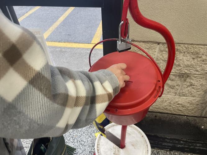 Bell ringers see their share of Scrooges amid gestures of generosity