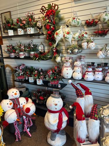 Florists start with the green and add the feelings to create holiday magic