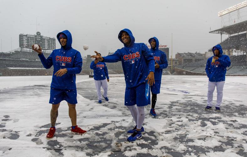 Scenes from Pirates-Cubs Opening Day: Hot start on a cold day in