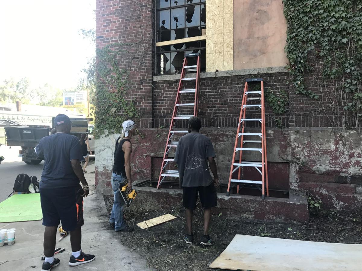 Volunteers fix up Gary's historic General Services Building