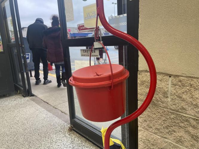 Bell ringers see their share of Scrooges amid gestures of generosity