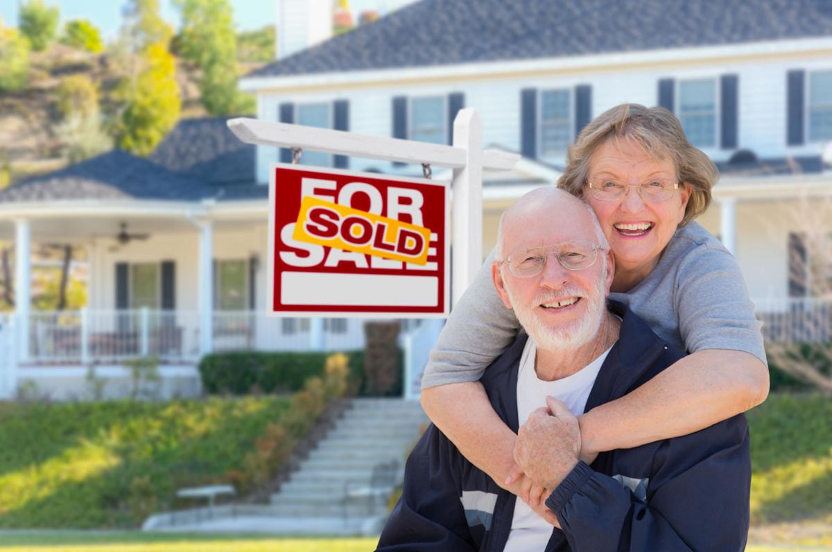 Senior Couple Selling Big House-Dreamstime