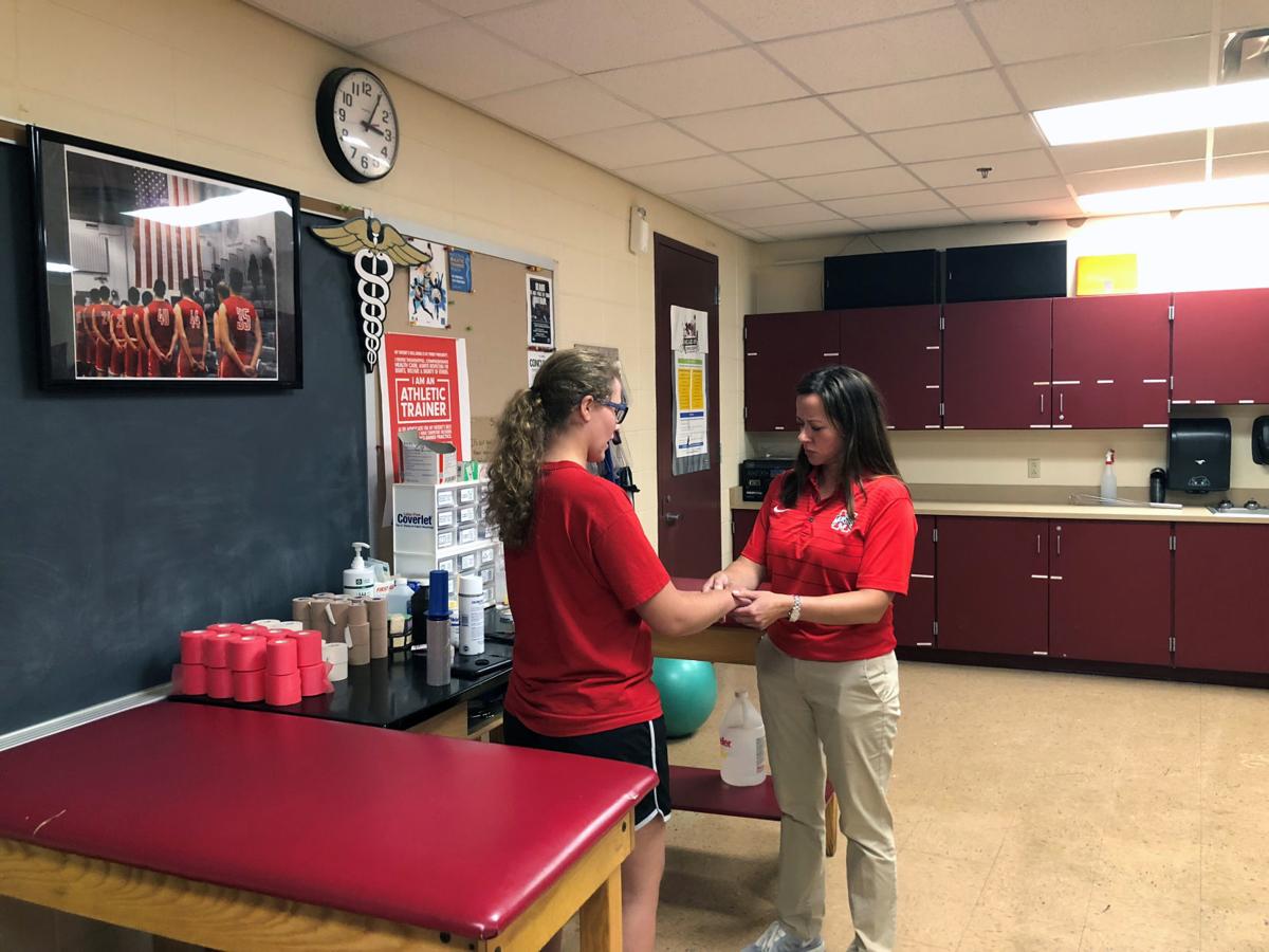 Schools search for athletic trainers