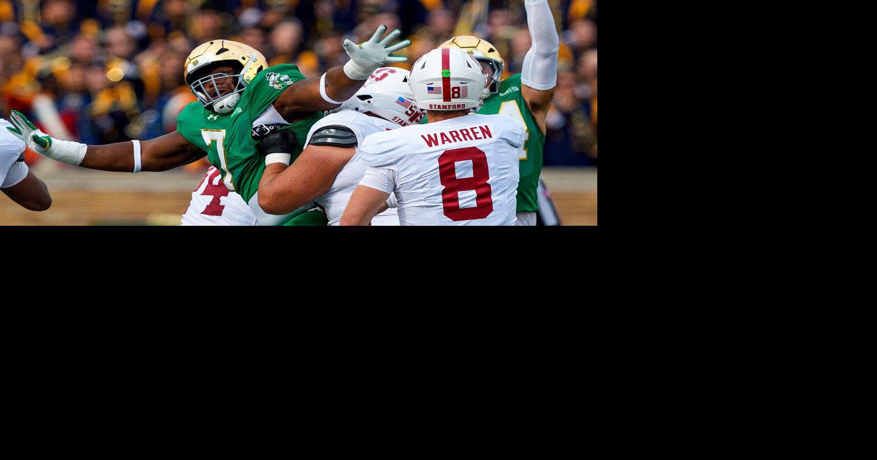 Notre Dame defensive lineman Francis Brewu (7) attempts to block a pass by Stanford quarterback Davis Warren (8) during a NCAA