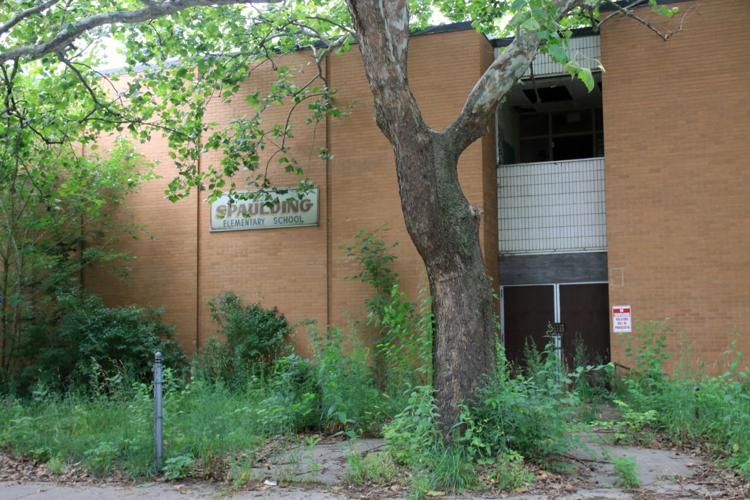 Vacant Emerson High School building gutted by fire in Gary