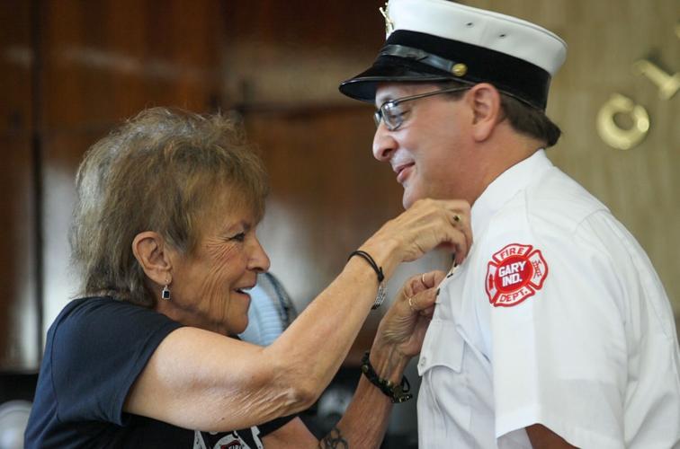 Fireﬁghters being honored and their new positions