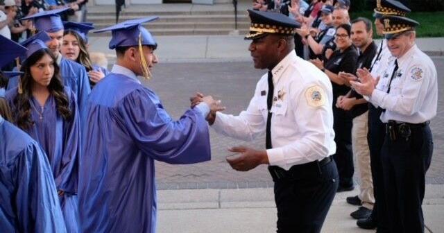 Chicago PD show out to graduation of fallen cop's son - Vimarsana News