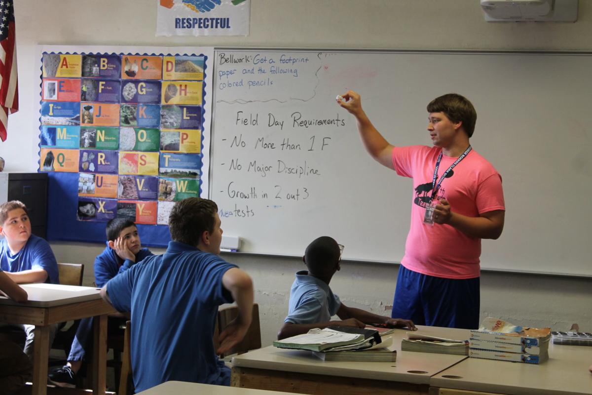 Clark Middle School teacher Nathan Miller built desks for students