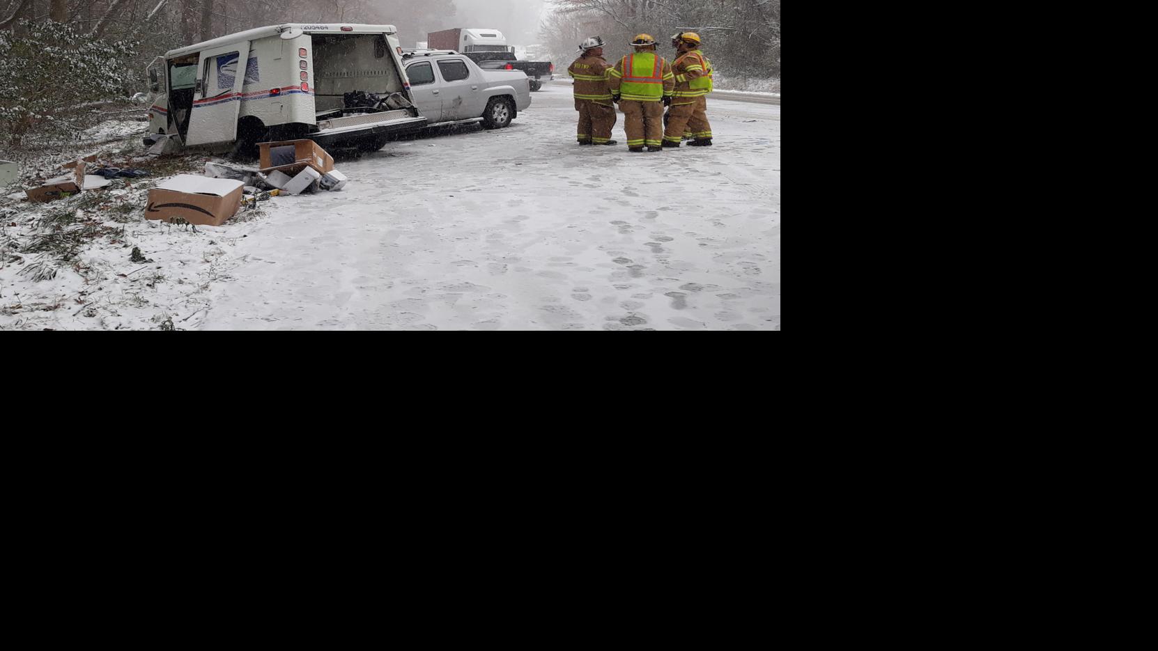 Accident involving mail truck spills packages on roadside near LaPorte
