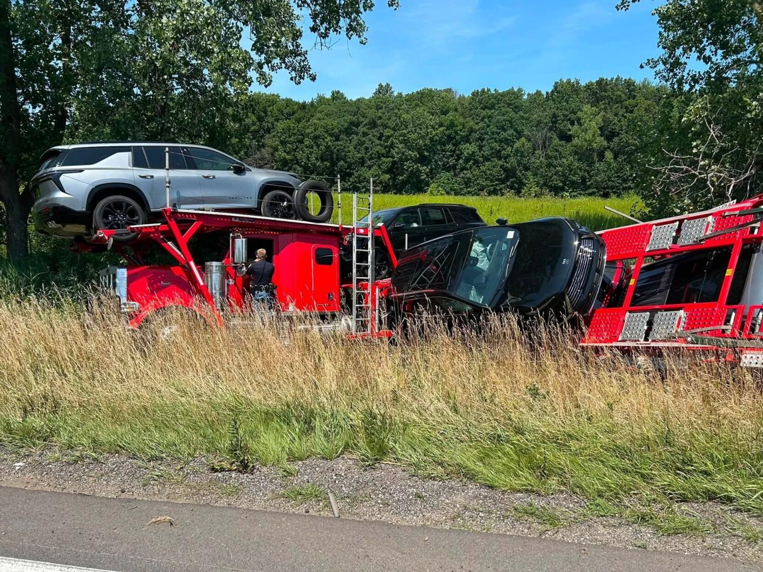 Car hauler rolls over on Interstate 94, traffic reduced to one lane