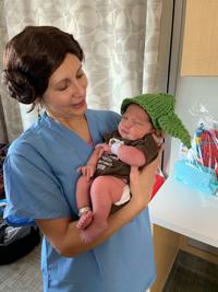 Babies don Baby Yoda caps at Franciscan Health hospitals