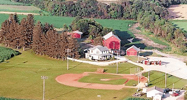 Ghost players assemble in the infield at the original Lansing Farm site in  Dyersville, Iowa, where the nostalgic movie Field of Dreams was filmed in  1989