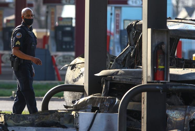 Woman dies after fiery crash into gas pump