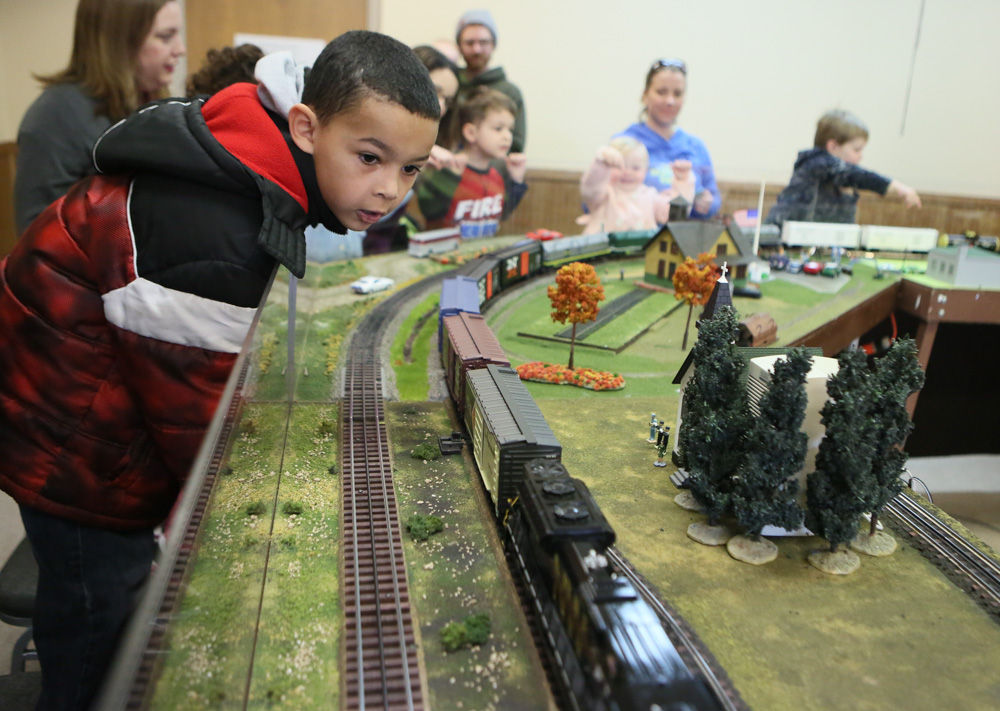 All aboard! Model train scenes charm young and old | Local 