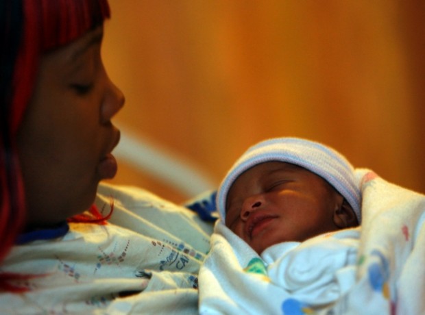 Surprised parents rush to name city's first baby of 2010