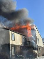 Region firefighters battle residential blaze in frigid conditions
