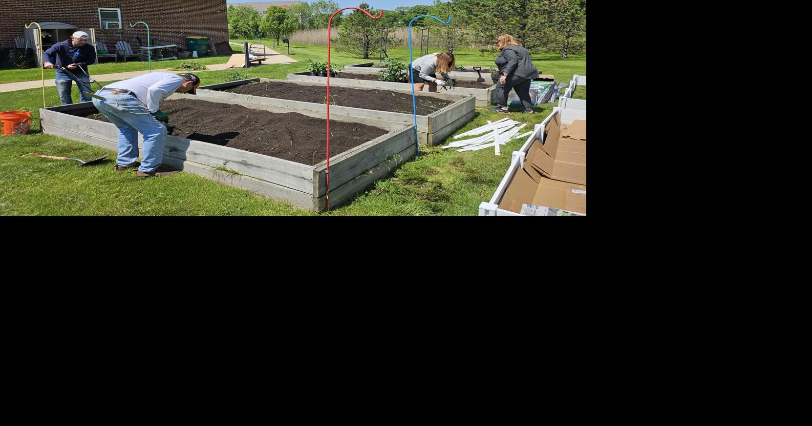 Crown Point Rotary Club plants food pantry garden at Wittenberg Village
