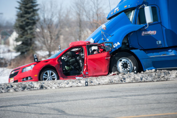 1 person in critical, airlifted after semi-car crash on Ind. 49