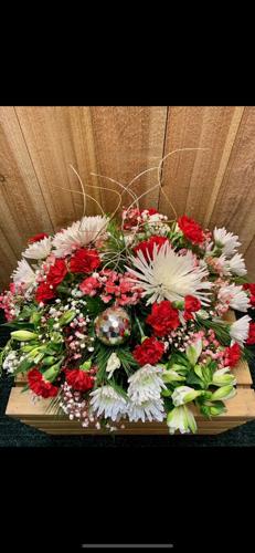 Florists start with the green and add the feelings to create holiday magic