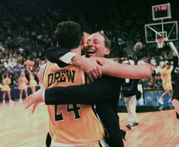 Valparaiso's head coach Homer Drew hugs his son, Bryce Drew